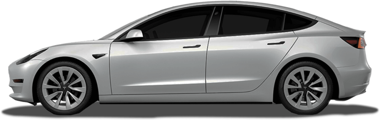 Silver Tesla Model 3 with dark tinted windows viewed from the side profile.