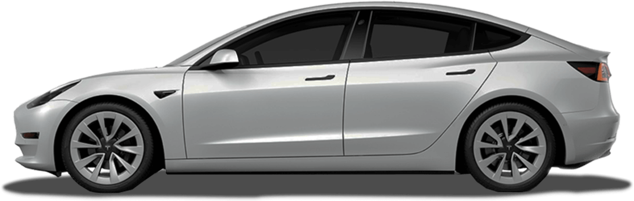 Silver Tesla Model 3 with visibly dark window tint applied, shown in a side profile.